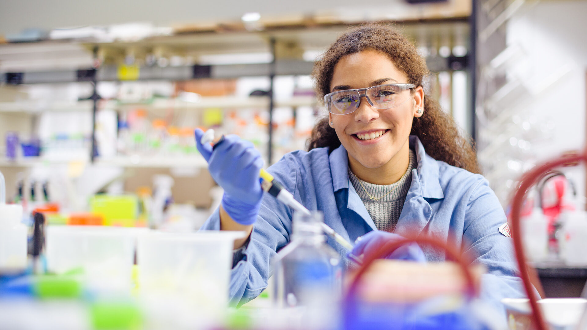 Kennedy Outlaw poses in a lab at Purdue University.