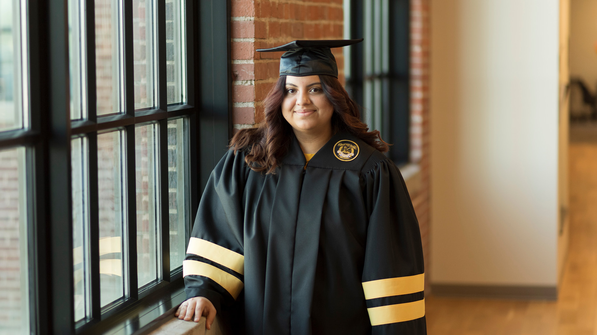 Caps and Gowns for Purdue Global Graduation