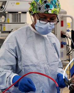 Krystal Dabon wears scrubs during an operation.
