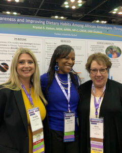 Angela Owens, Krystal Dabon and Amy Daly pose for a photo at the 2021 Sigma Theta Tau convention.