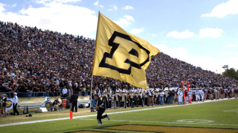 Boilermakers cheer at a football game.