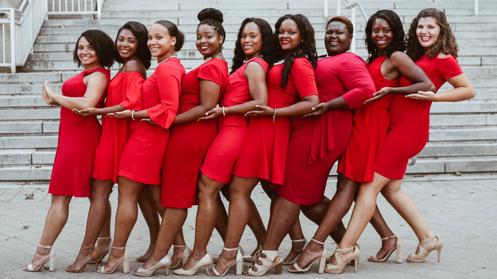 Sydney Tucker poses with eight Delta Sigma Theta sisters