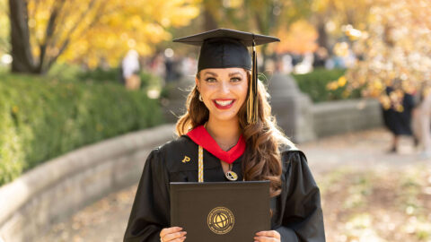 Lisa Holman with her Purdue Global degree.
