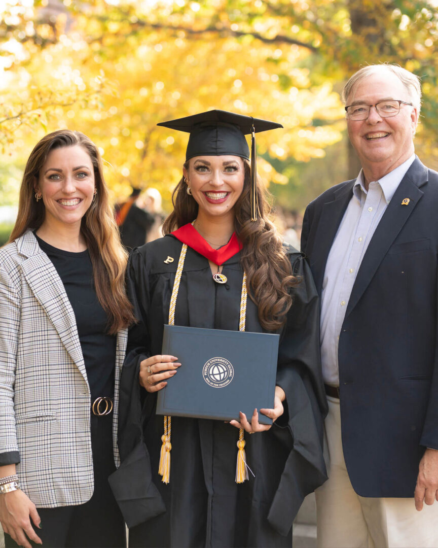 Lisa Holman with her family at Purdue Global’s Fall 2022 commencement.