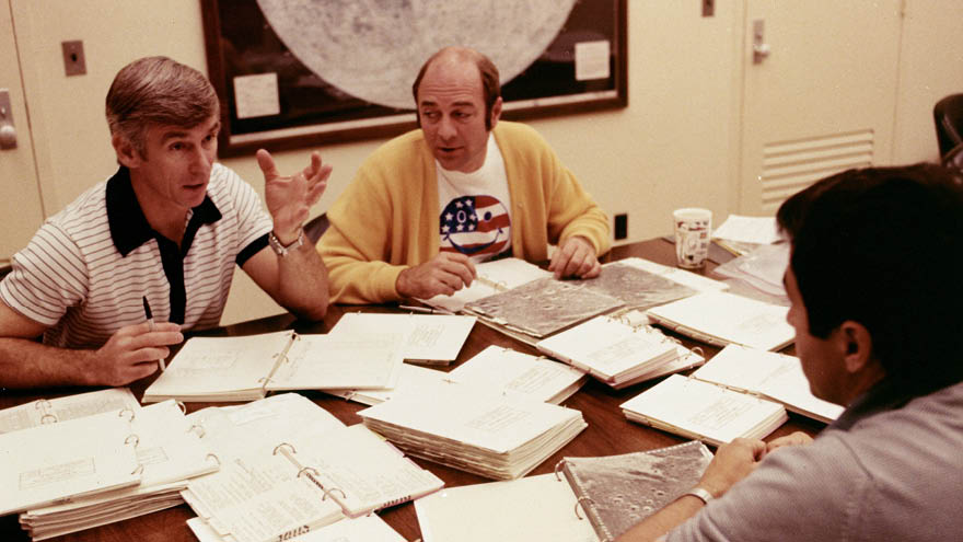 Apollo 17 astronauts Eugene Cernan, Ron Evans and Jack Schmitt review mission plan
