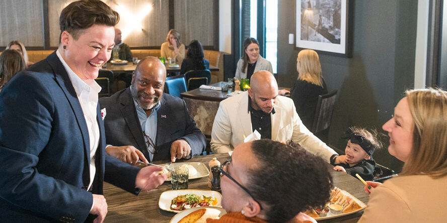 Leanna Chroman chats with restaurant guests at HC Tavern + Kitchen.