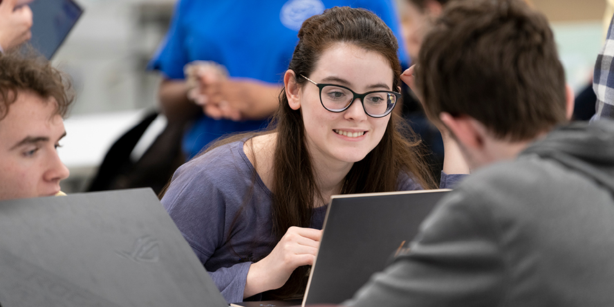 Students discuss a project in the EPICS lab