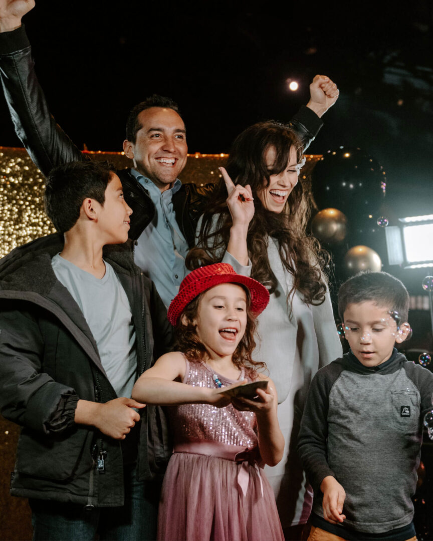 The Gramlich family celebrates at the Purdue Global Winter 2023 Commencement.