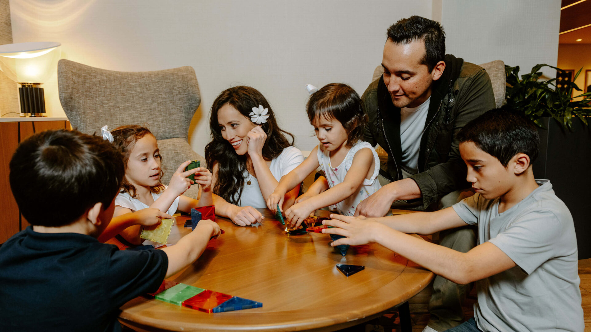 Michelle and Shane Gramlich play alongside their four children.