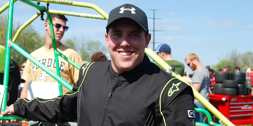 Alex Offenbach smiling after finishing the 2016 Purdue Grand Prix.