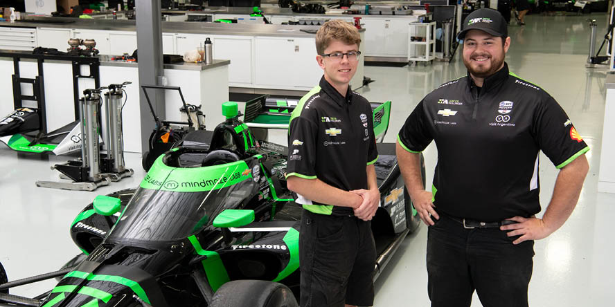 Zachary Nelson alongside fellow Juncos Hollinger Racing intern Max Ohl.