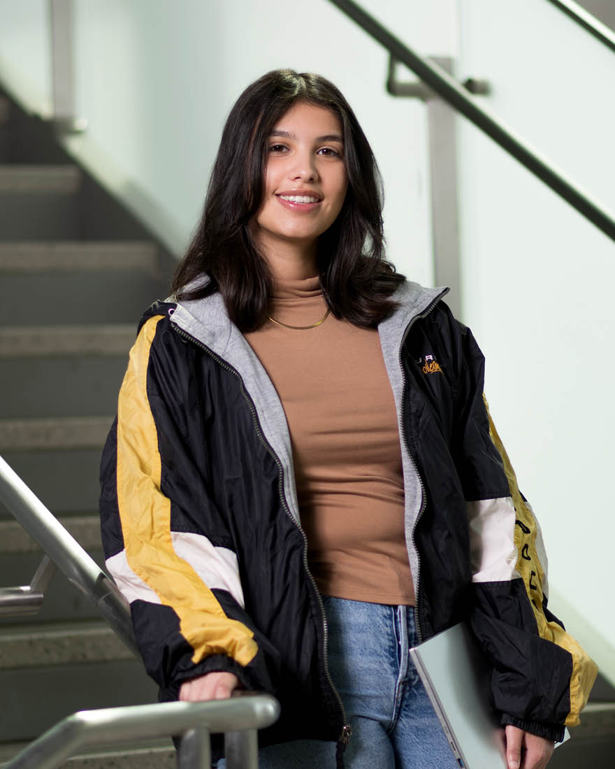 Alyssa Rodriguez standing on steps.