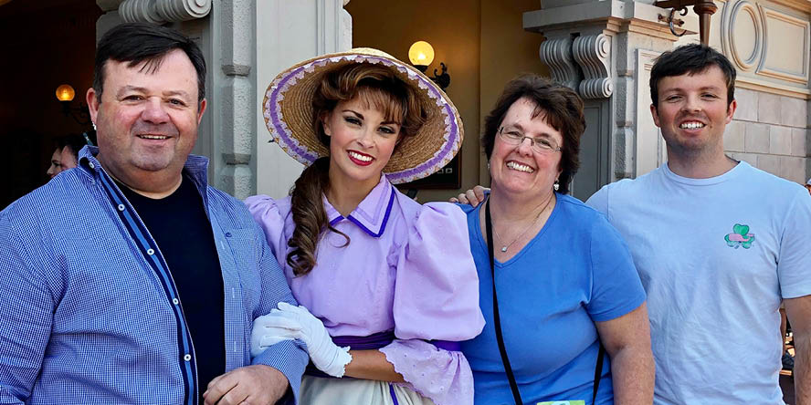 Bruso poses with her family, dressed in costume for the Main Street Trolley Show