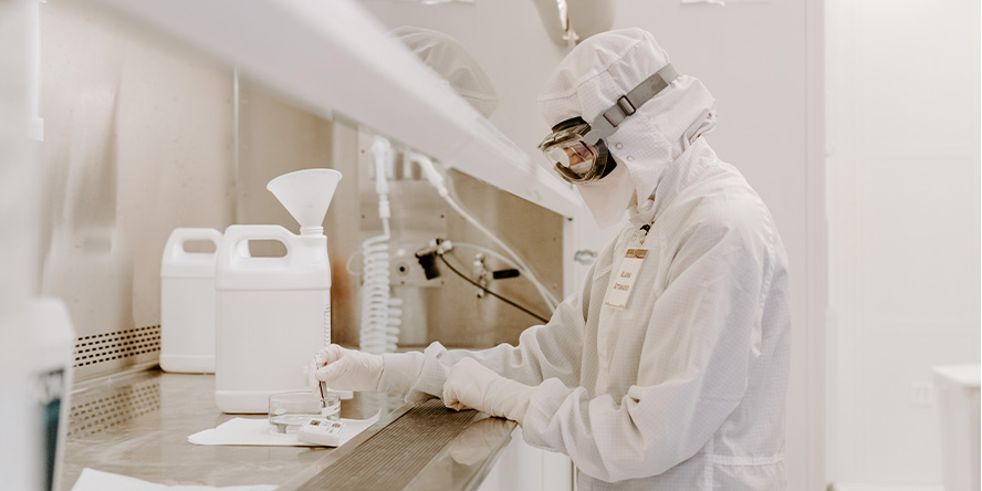 A researcher works in the Scifres Nanofabrication Laboratory cleanroom at Purdue’s Birck Nanotechnology Center