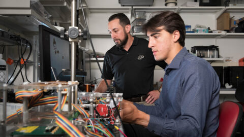 Dave Cappelleri and Georges Adam work in Birck Nanotechnology Center.