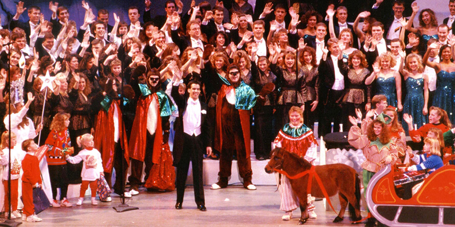 Performers wave during the 1991 Purdue Christmas Show