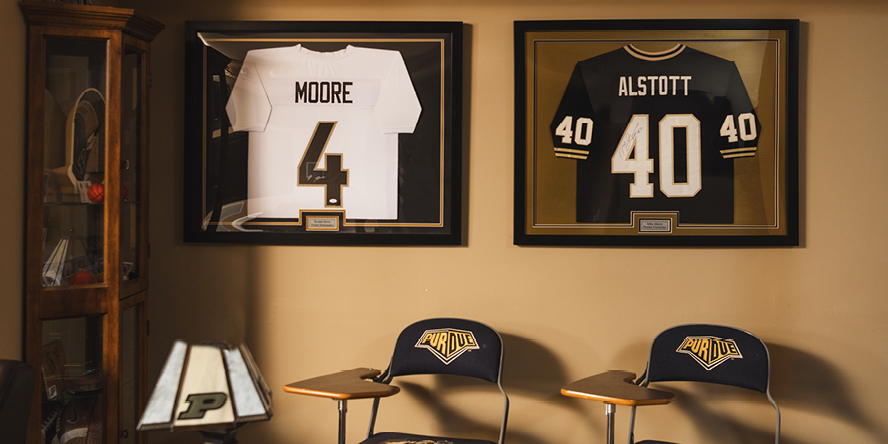 Framed autographed jerseys of Purdue football standouts Rondale Moore and Mike Alstott