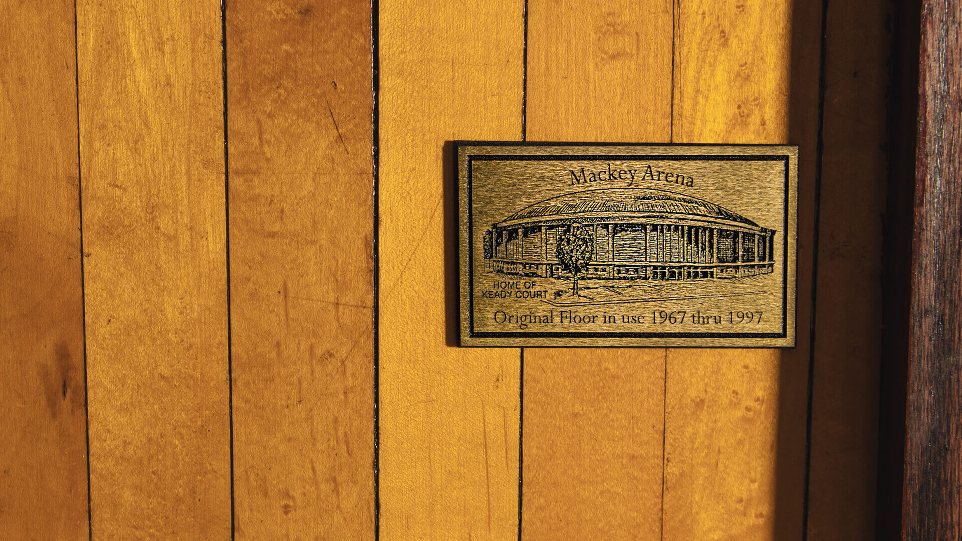 A Mackey Arena label on Don Hunt’s section of flooring from the basketball court