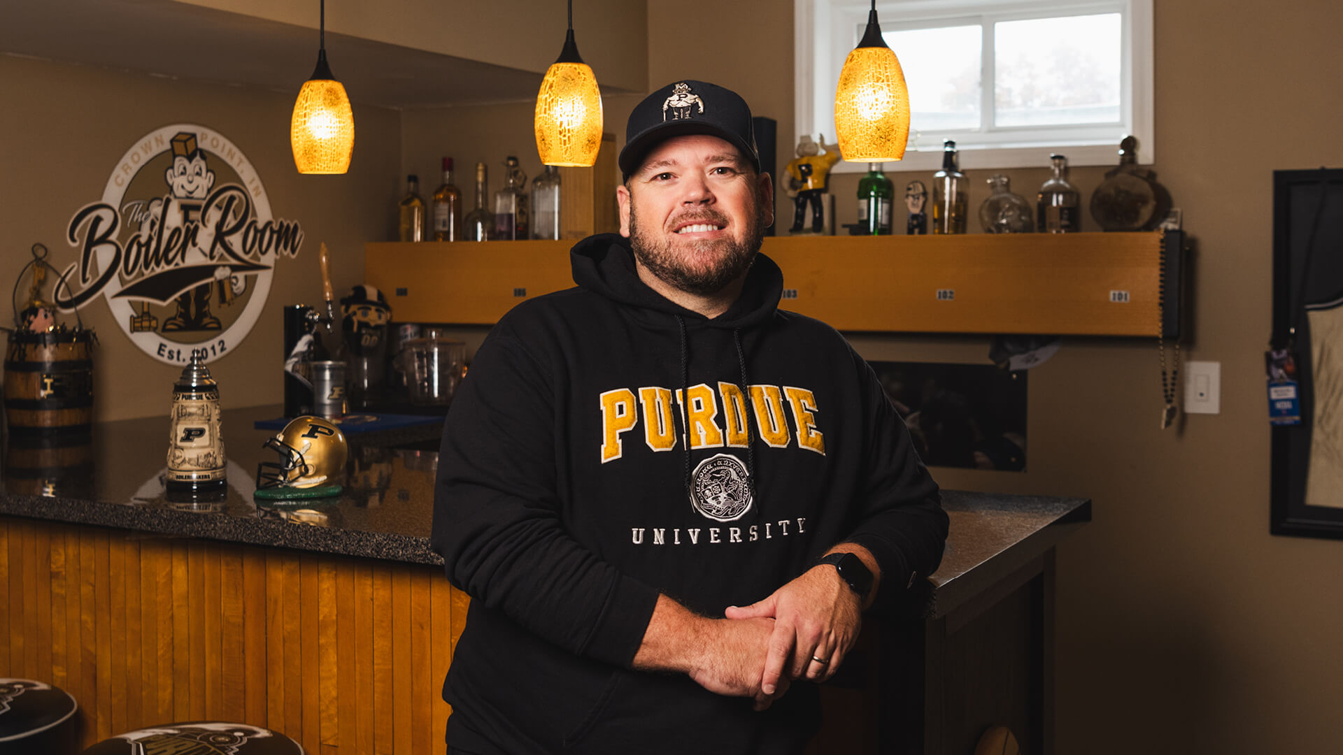 Purdue alum Don Hunt and his bar built using a section of original flooring from Mackey Arena