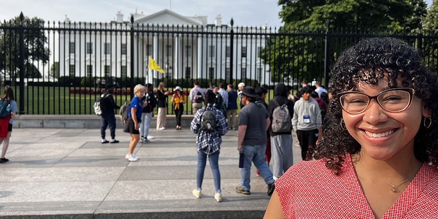 Shye Robinson in front of the White House.
