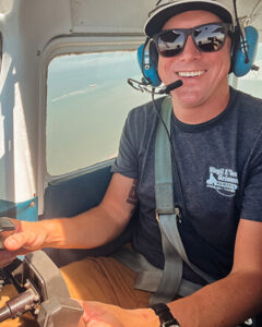 Waggle flying a plane for the first time on his journey toward earning a private pilot's license. (Photo courtesy of Dominic Austen)