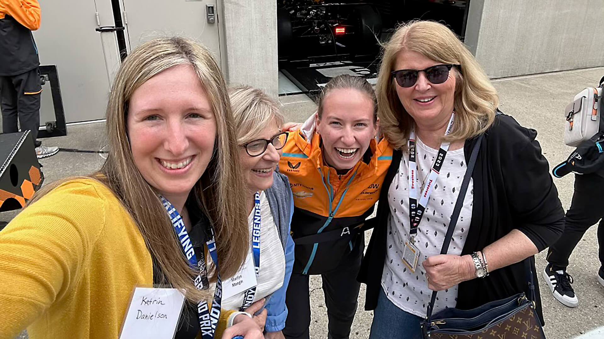 Lizzie Todd and Terri Talbert-Hatch pose for a selfie with friends at the Indianapolis Motor Speedway