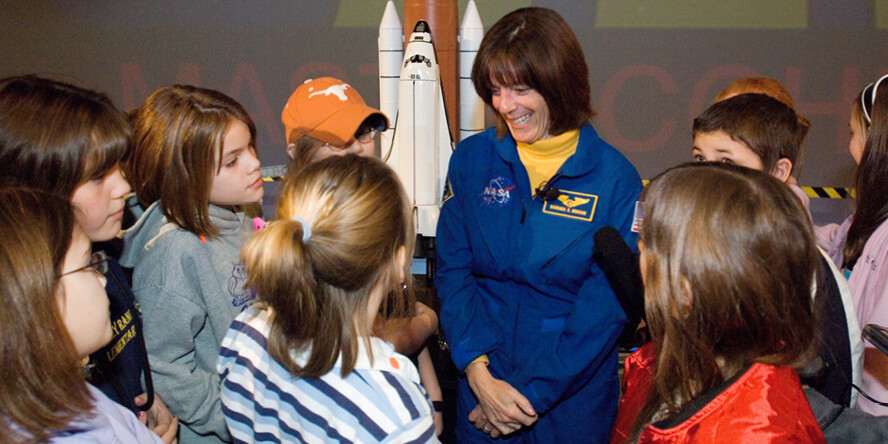 Barbara Morgan with a group of students.