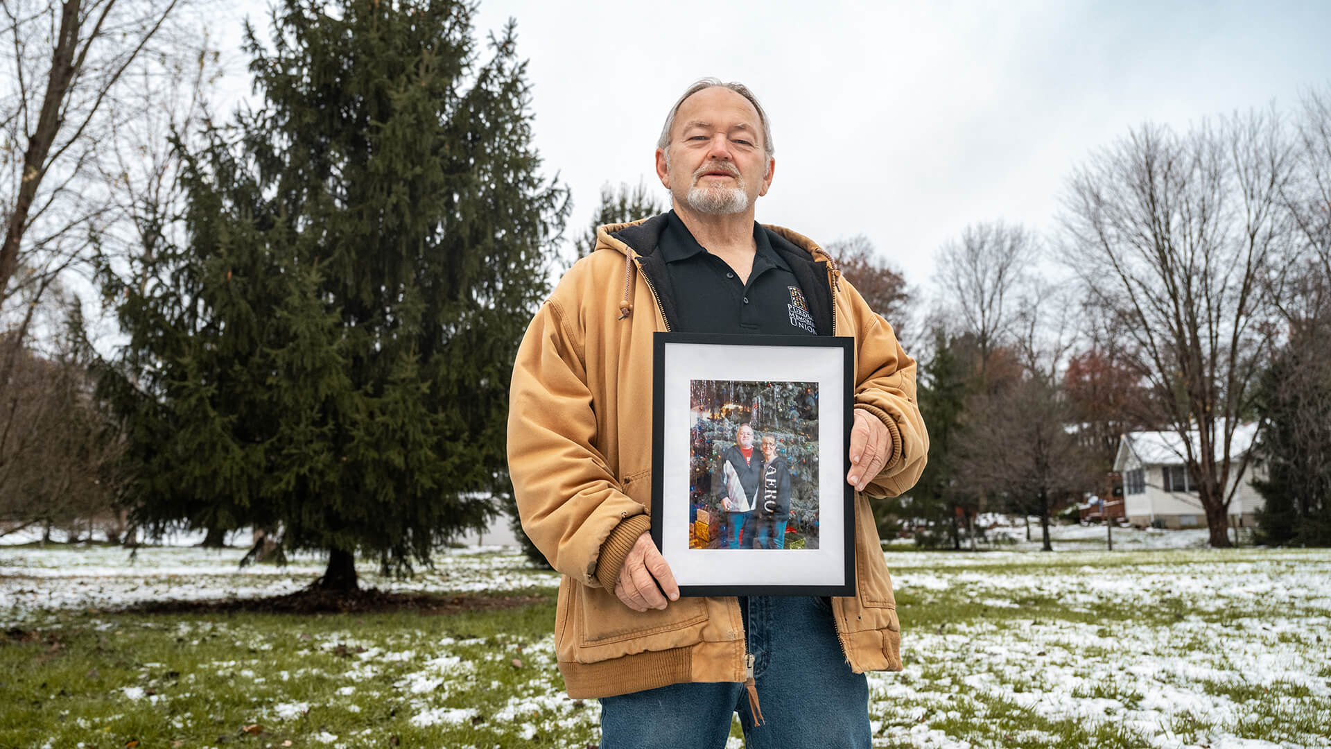 Darrell and Tina Smith pose for a photo at the Purdue Memorial Union Christmas tree.