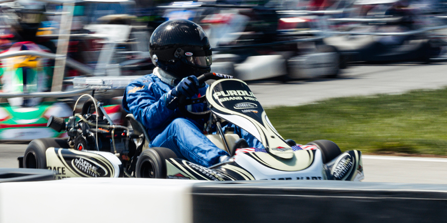 Pace kart driver Doug Boles drives a lap around the track