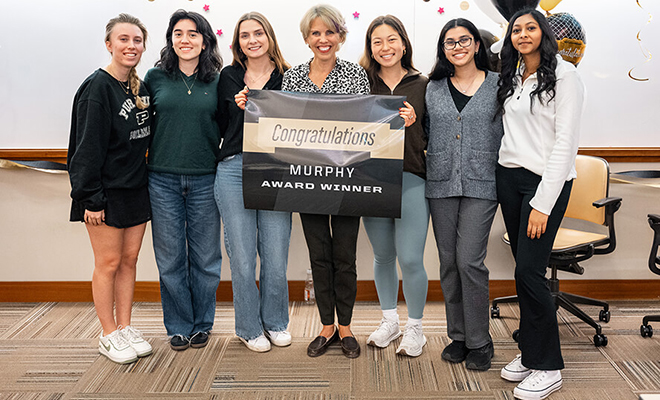 Cara Putman after winning a 2025 Charles B. Murphy Award.
