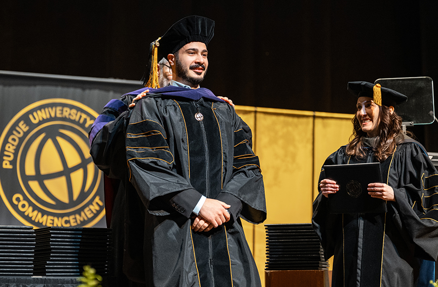 Joud Elias in his cap and gown at his Purdue Global Law School graduation.
