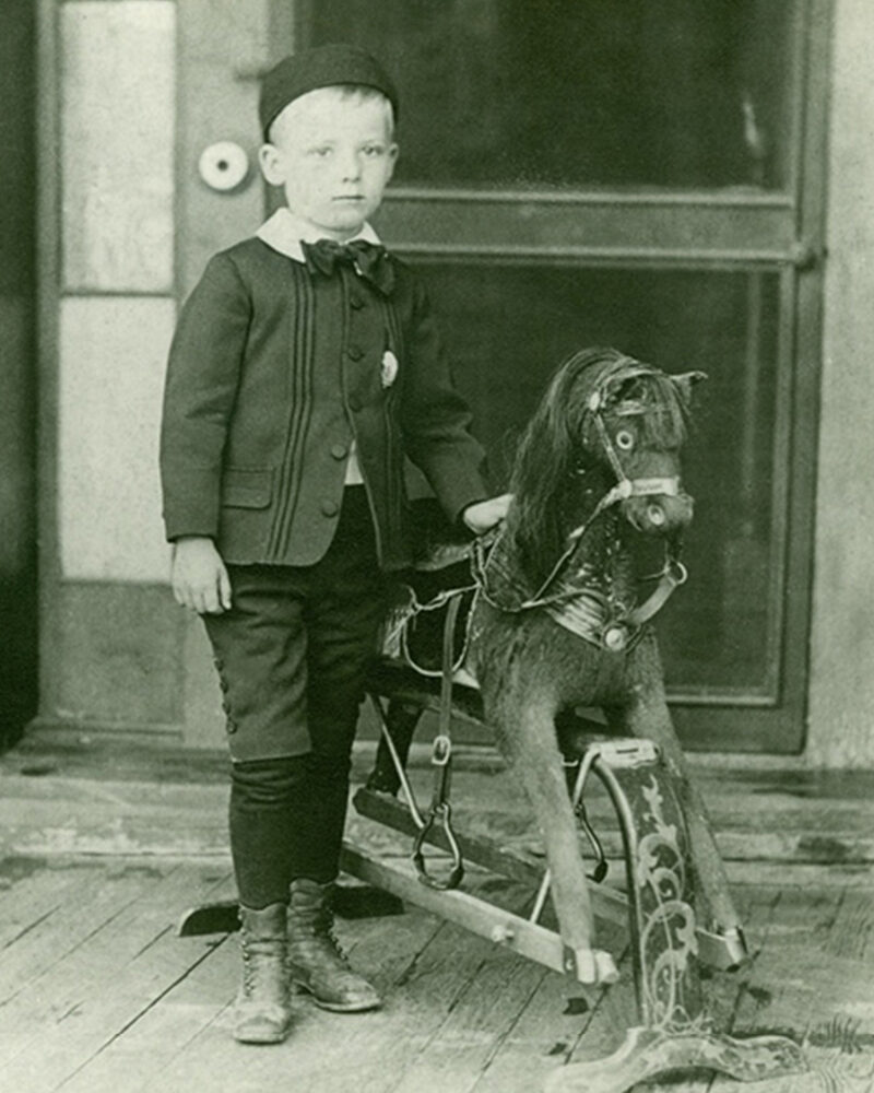 Fred W. Long with a hobby horse.