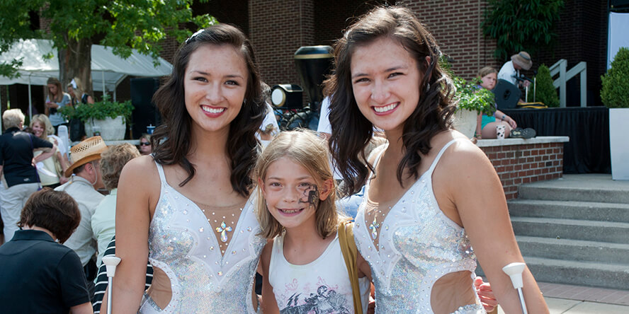 Sara and Chellie Zou with a Purdue fan.