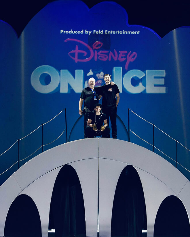 Robert Cohen standing on the Disney On Ice stage.