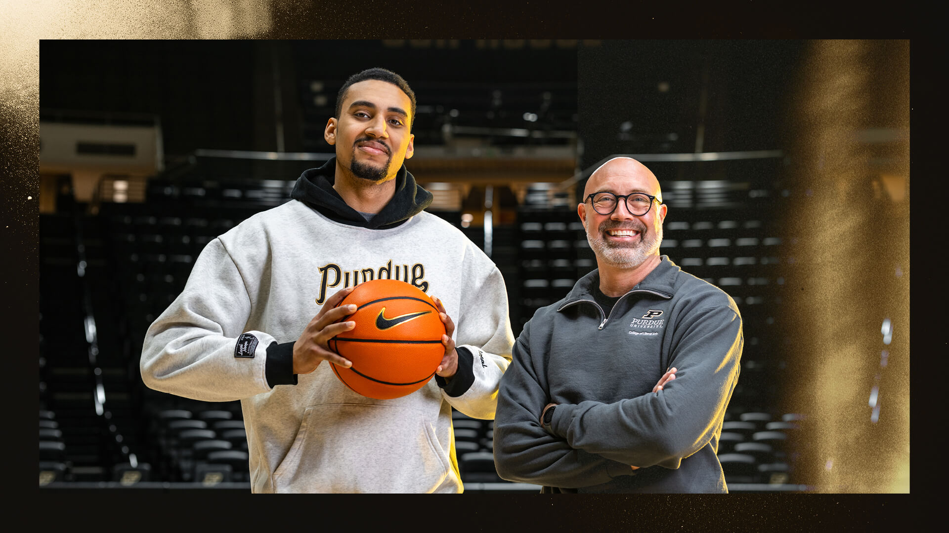 Boilermaker basketball’s Trey Kaufman-Renn and College of Liberal Arts dean Christopher Yeomans