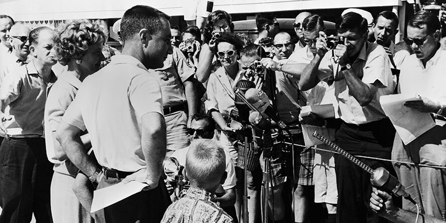 Gus Grissom and family speaking with reporters
