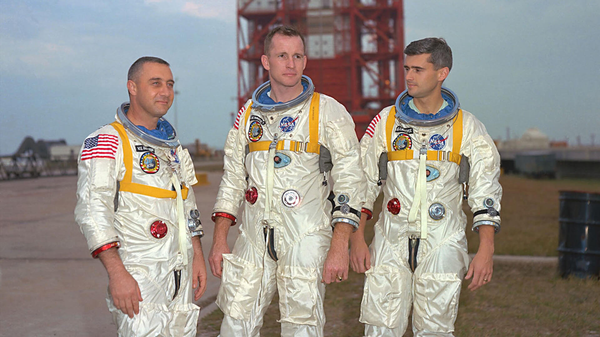 Apollo 1 astronauts Gus Grissom, Ed White and Roger Chaffee stand near the launchpad
