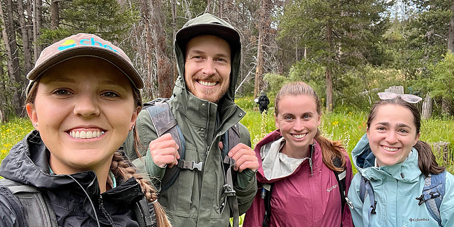 Megan Casey conducting fieldwork with cbec eco-engineering coworkers.