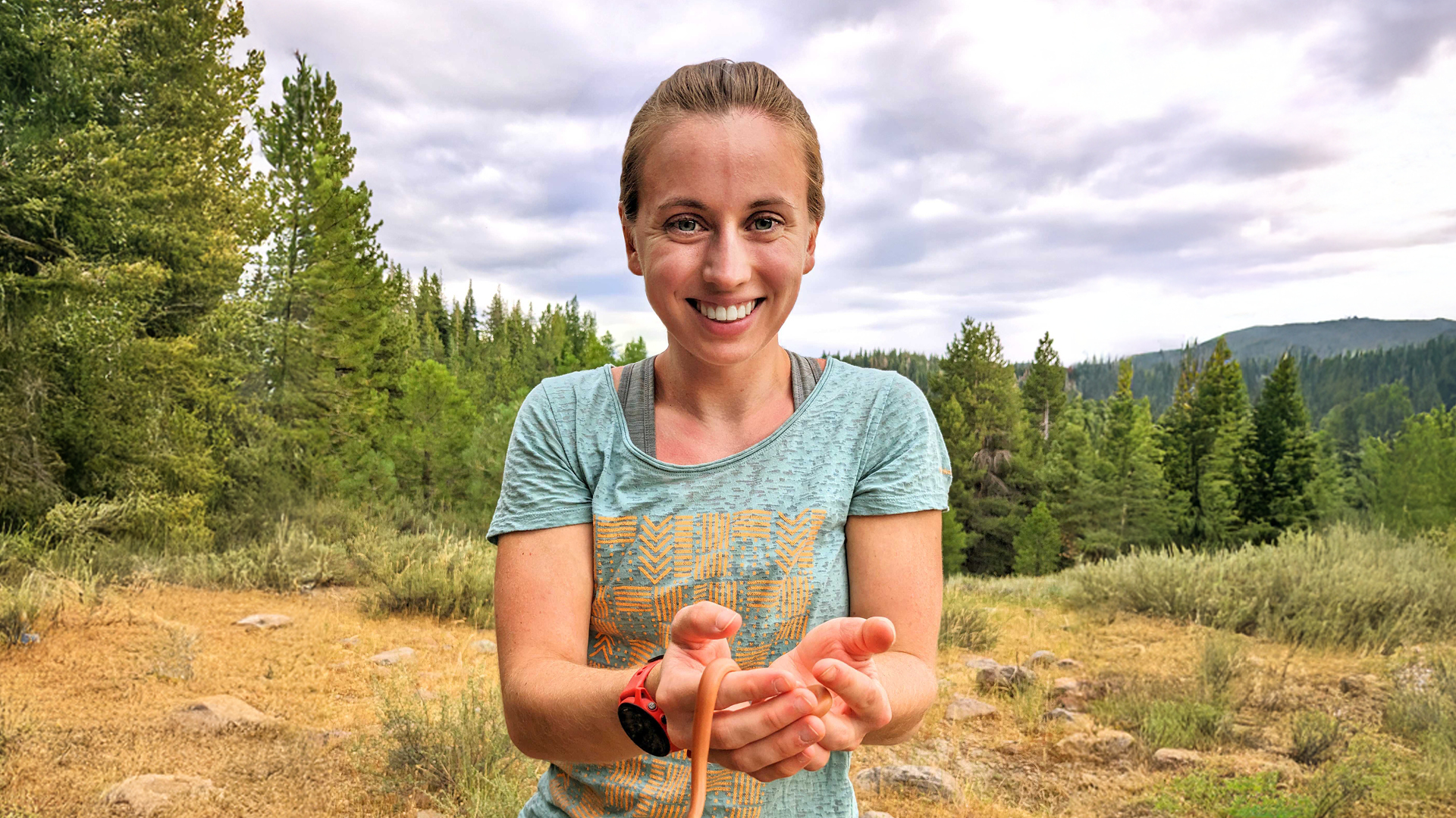 Megan Casey holding a snake.
