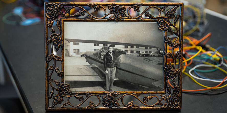 A framed photo of Steven Collicott’s father, Howard, that Collicott displays in his office