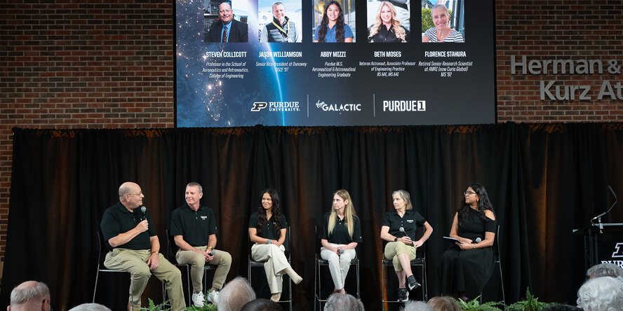 A group of speakers address the audience at the Purdue 1 announcement in September 2025