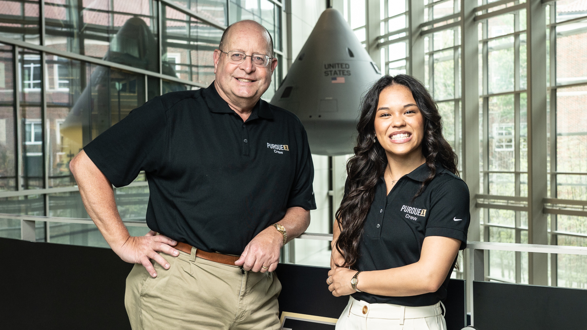 Purdue professor Steven Collicott and graduate student Abigail Mizzi pose for a photo in the Neil Armstrong Hall of Engineering