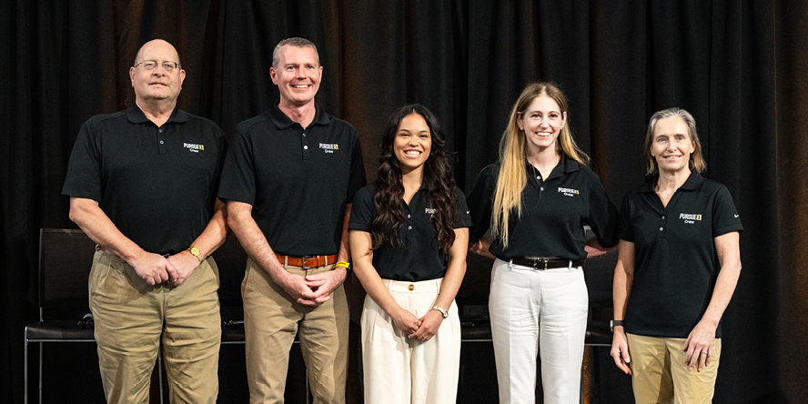 The crew of the Purdue 1 mission poses for a photo at their introductory press conference