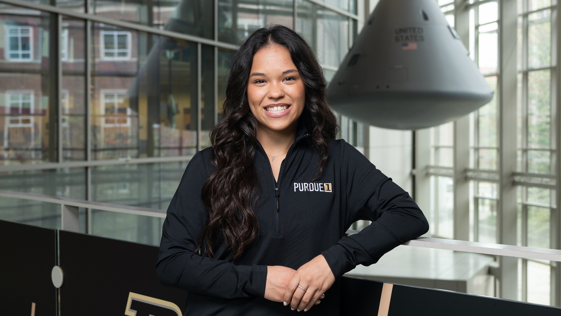 Purdue student Abigail Mizzi poses for a photo at the Neil Armstrong Hall of Engineering