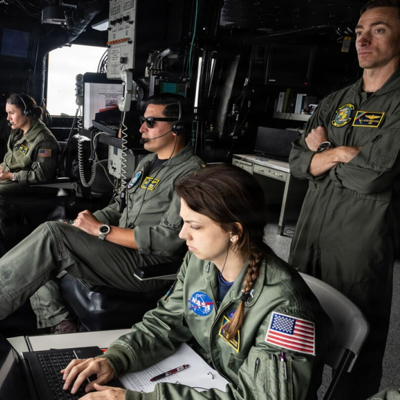 Emily Spreen and colleagues on the landing and recovery team help pinpoint where the Orion capsule will land in the Pacific Ocean 