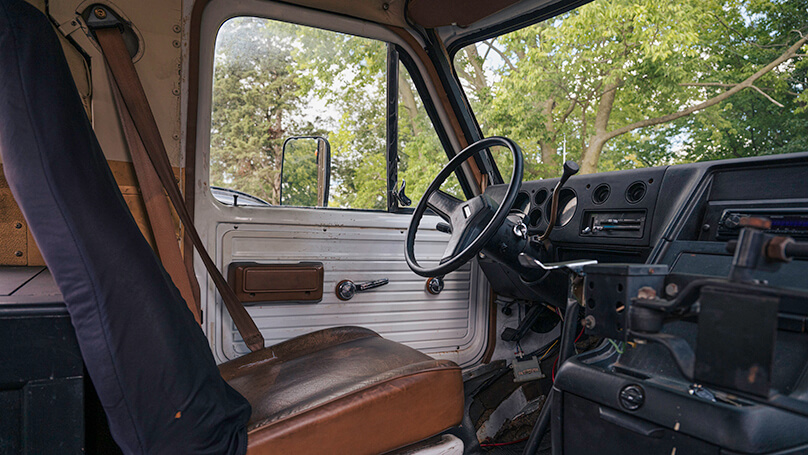 The driver’s seat of the bus.