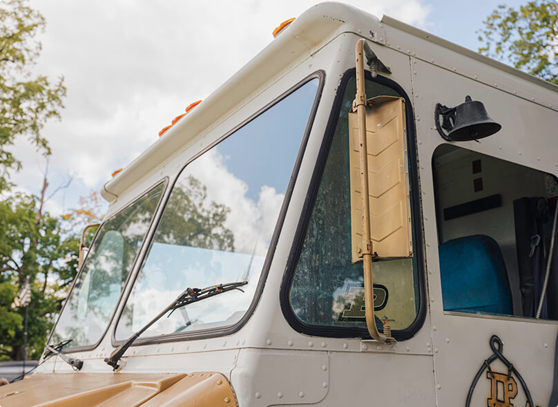 A bell attached to the bread truck.