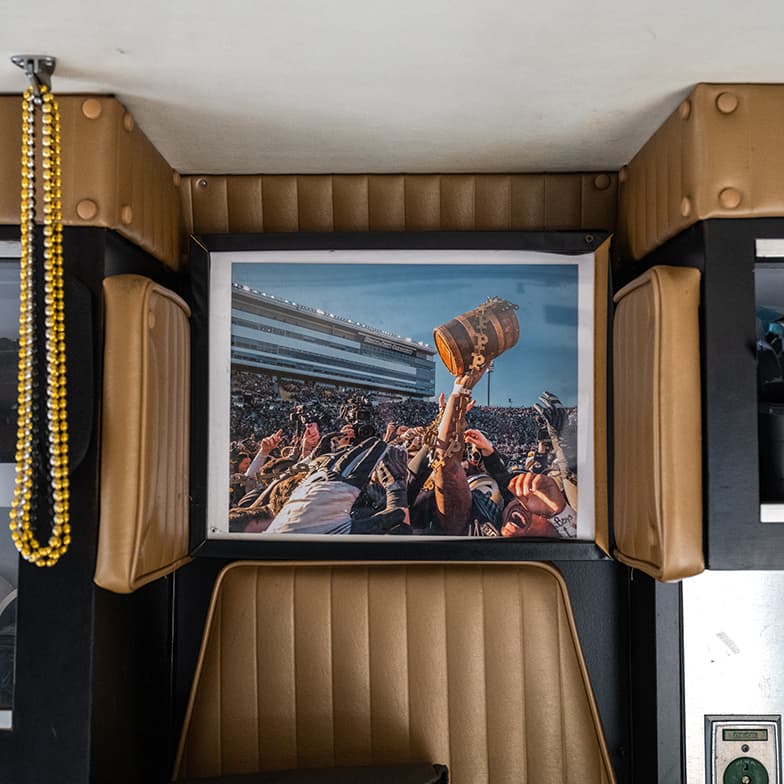 A framed photo of the Old Oaken Bucket inside of the ambulance.
