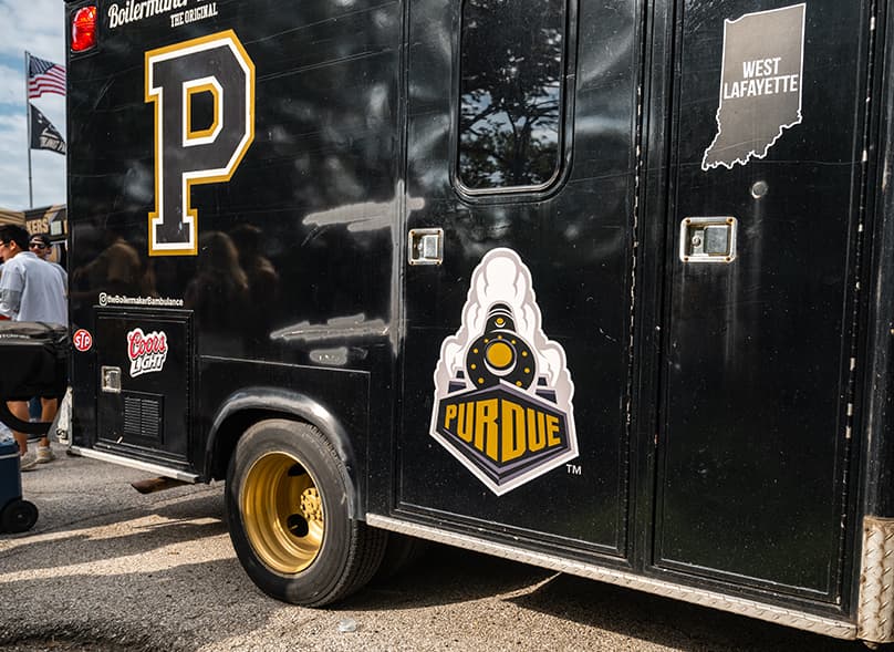 The ambulance is painted with Purdue details
