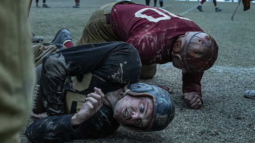 Ray Nicholson portrays Tony Butkovich in a scene from a Purdue football game in “The Mosquito Bowl.”